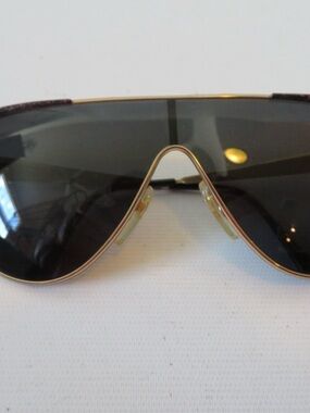 Gucci Oversized Shield Sunglasses in Gold and Black